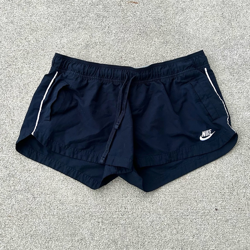 Women’s vintage navy Nike athletic shorts with adjustable drawstring